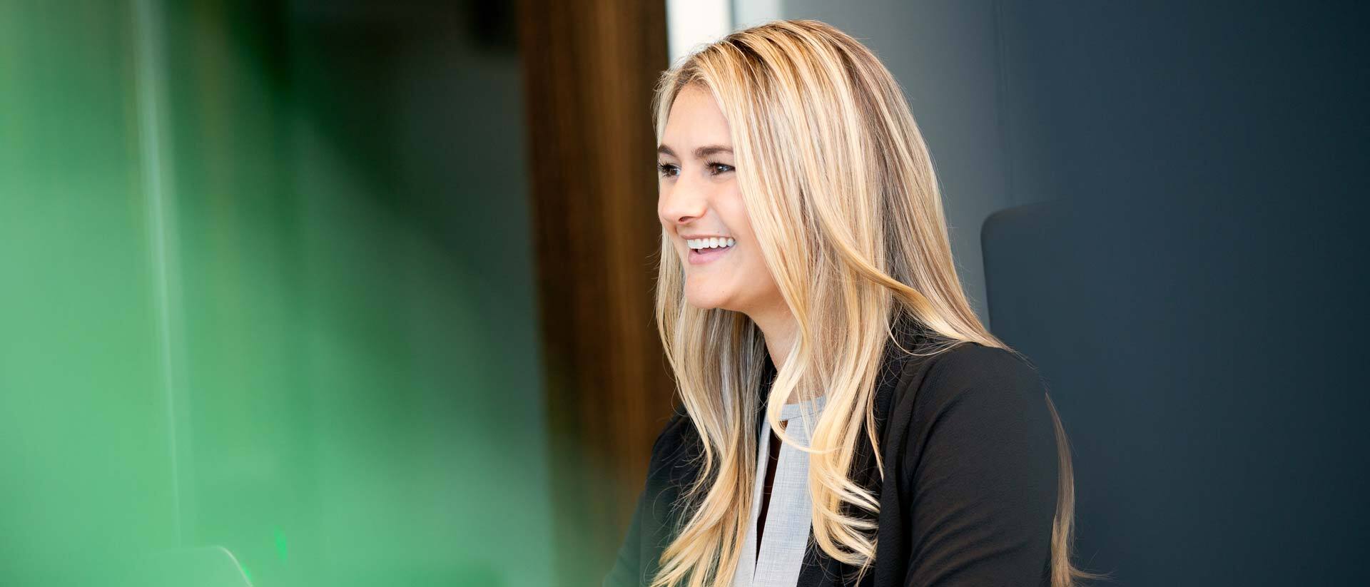 MSU Alumnus and FMI Scholar Greer Clausen smiles