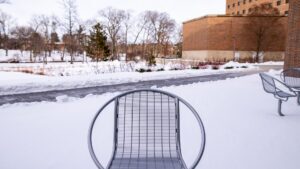 Zoom background set outside the Minskoff Pavilion at MSU, facing the red cedar river