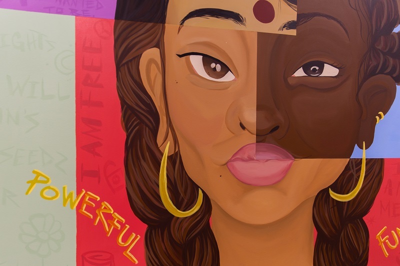 Close up of MBP mural with words 'powerful' featured.