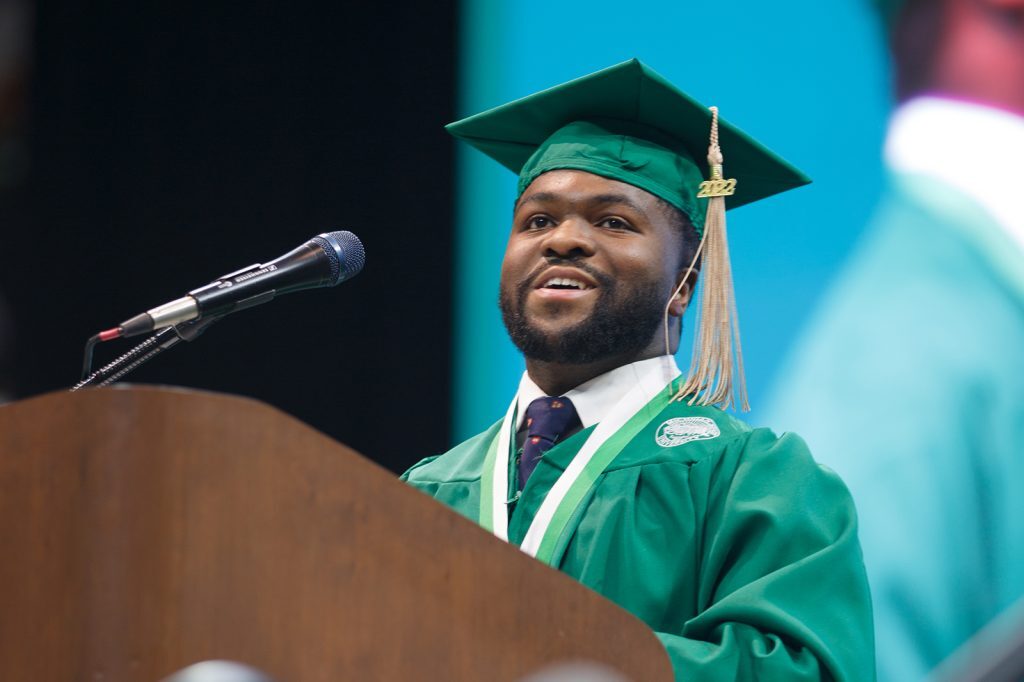 Broad student Darryl Ervin addressing the Class of 2022 from the podium at commencement.