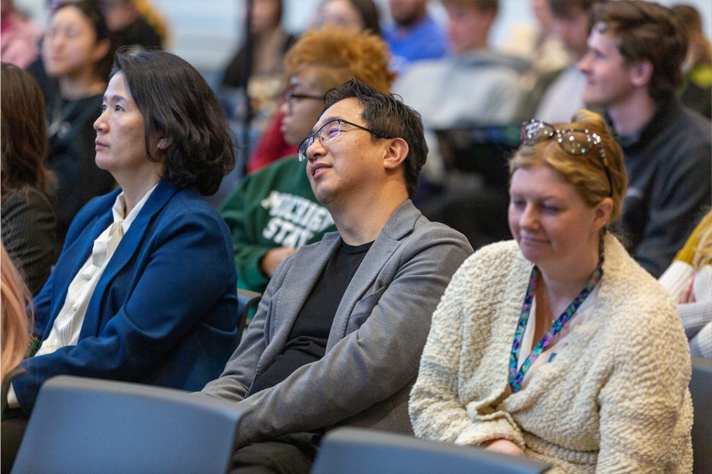 Faculty and staff audience members listen to David Lanterman's presentation.