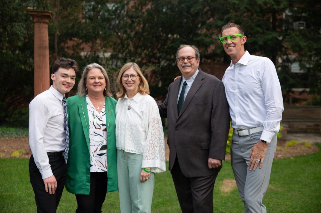 Student speaker Carlos Conrad, Interim Dean Judith Whipple, MSU Interim President Teresa K. Woodruff, alumni award recipient Jerry Jonckheere and alumni speaker Erik Qualman pose for a picture.