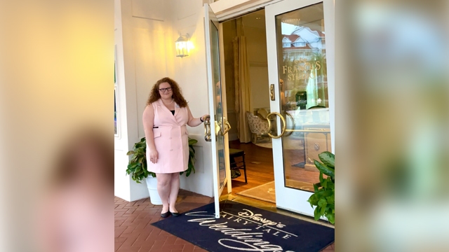 Linsey Nichols holding the door open to Franck