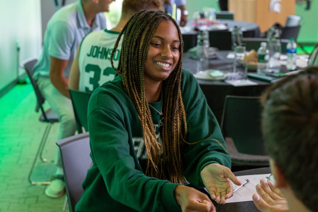 Spartans engage with one another at an event in the Minskoff Pavilion.