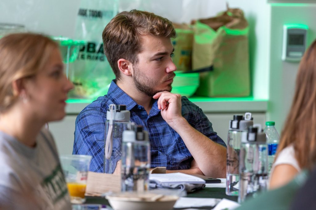 Spartans focus and listen while attending an event in the Minskoff Pavilion.