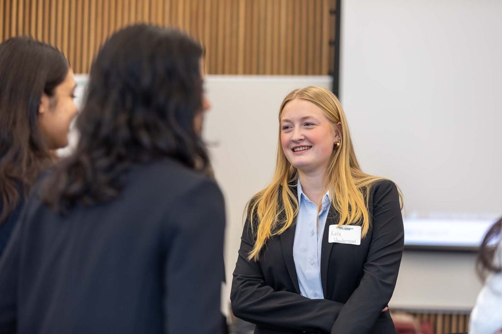 DWLA Scholars talk with one another at the launch event.