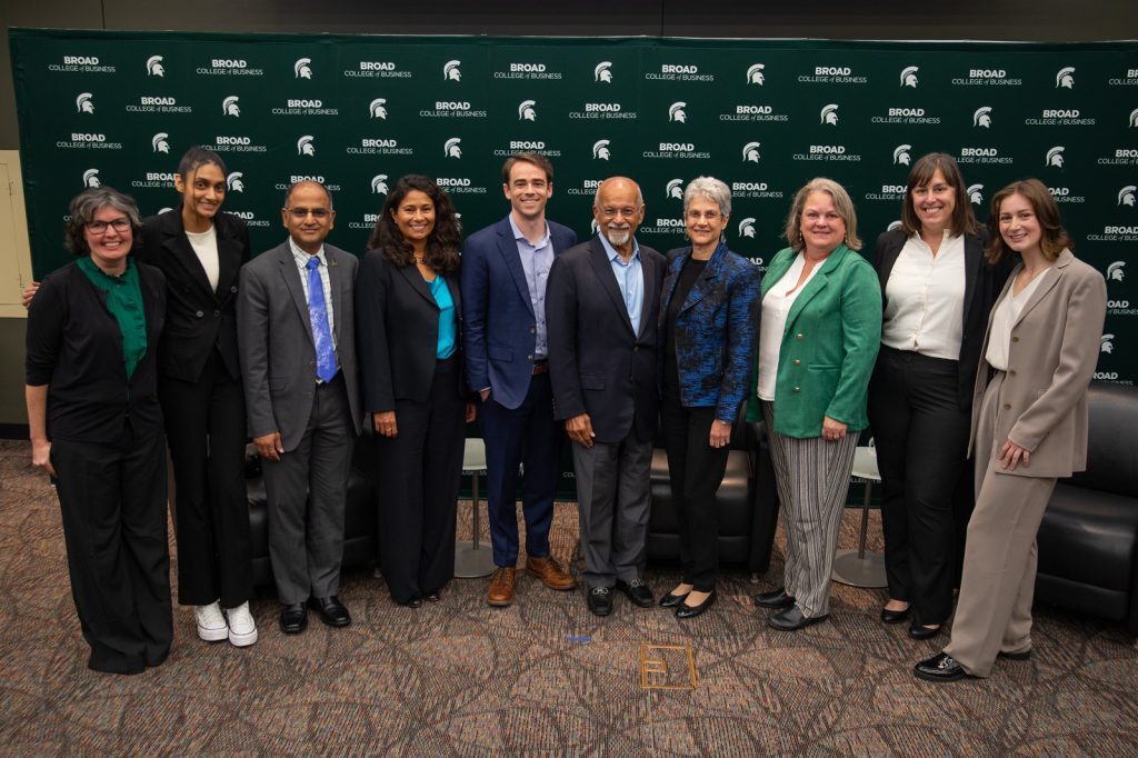 Sponsors, alumni and Broad faculty and staff pose for a group photo at the 2023 Gupta Family Ethics Lecture in the Broad College.