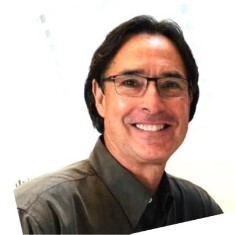 A headshot of Scott Weiss, CEO of Speakeasy.