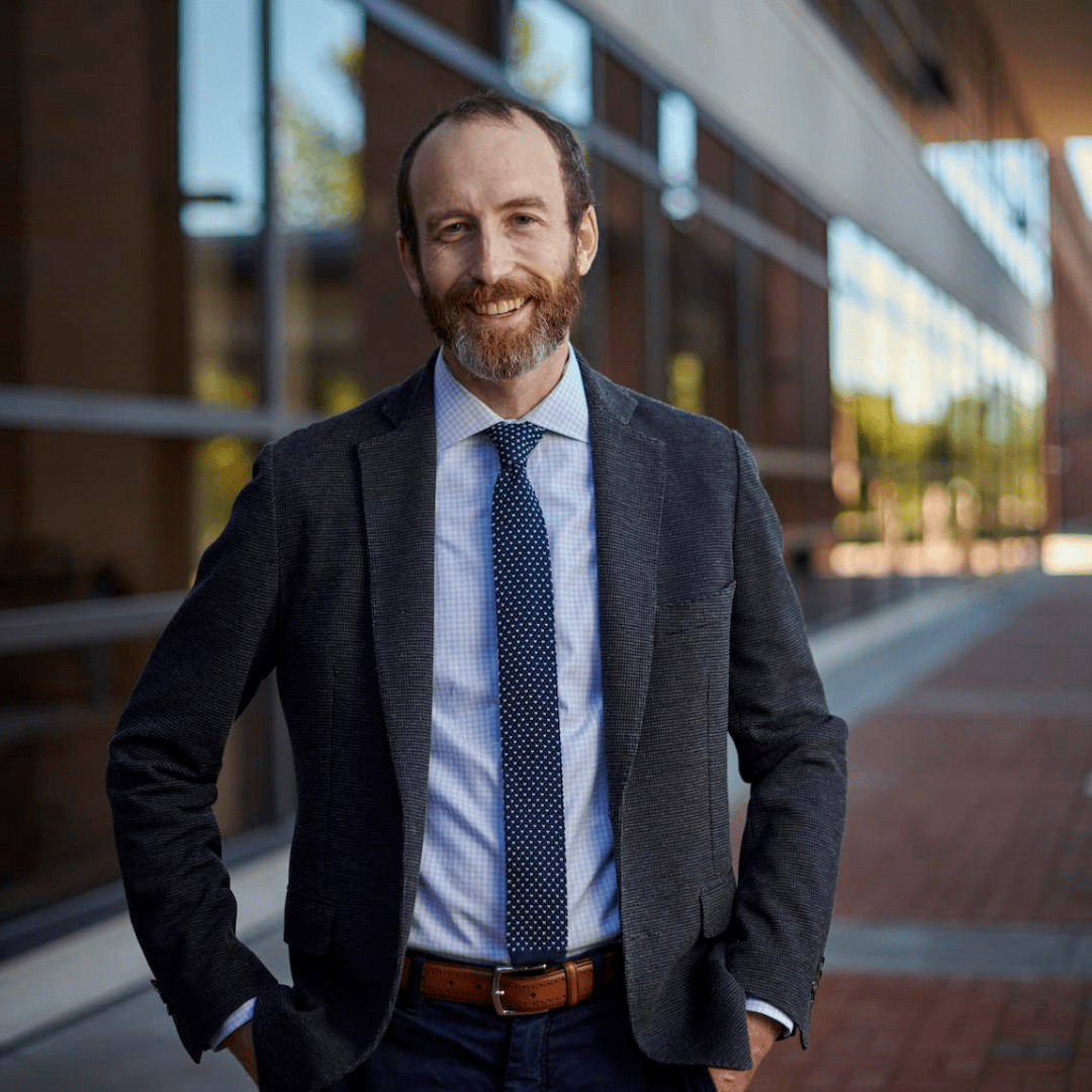 A portrait photo of Justin Simard, Associate Professor Michigan State University College of Law.
