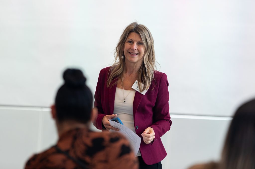 Cheri DeClerq speaking to students