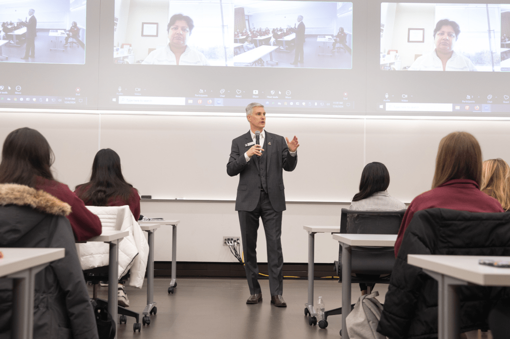 Dean David Souder presenting to event attendees