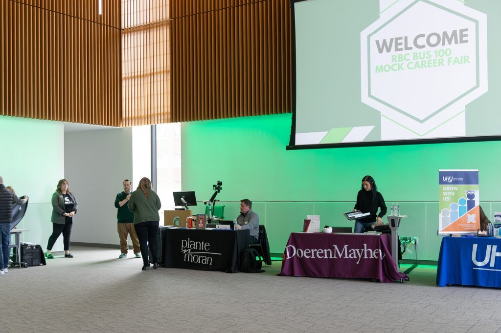 Students at career fair booths