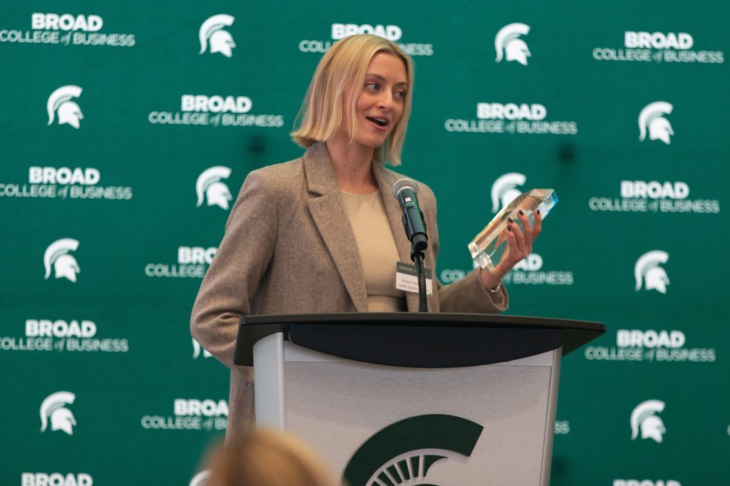 Ariana Ferwerda giving a speech and Michigan State