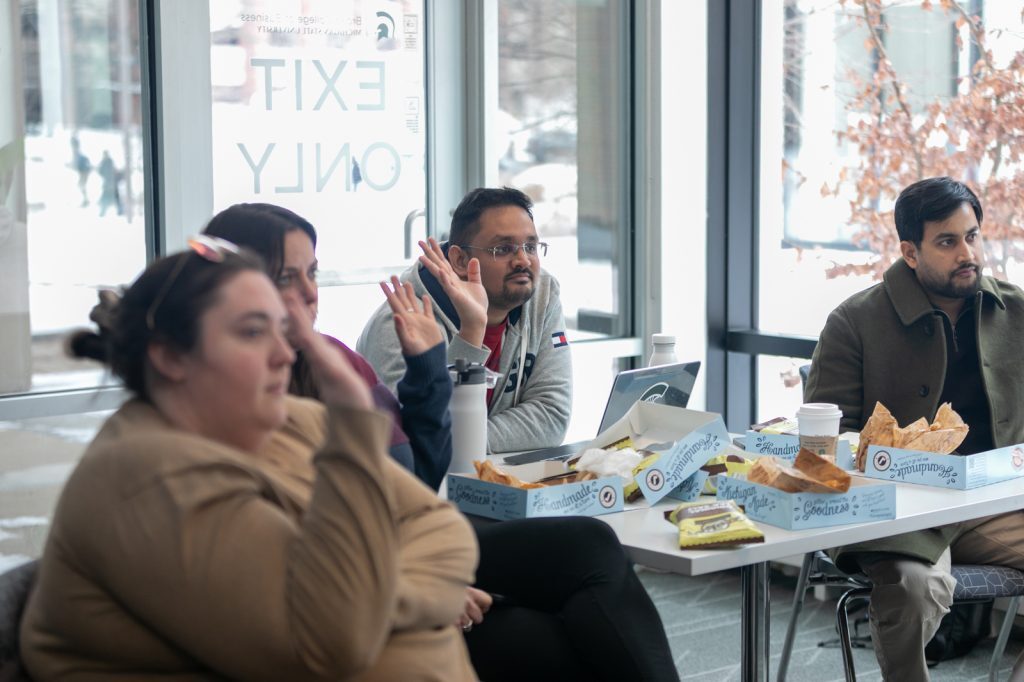 Students raising their hands