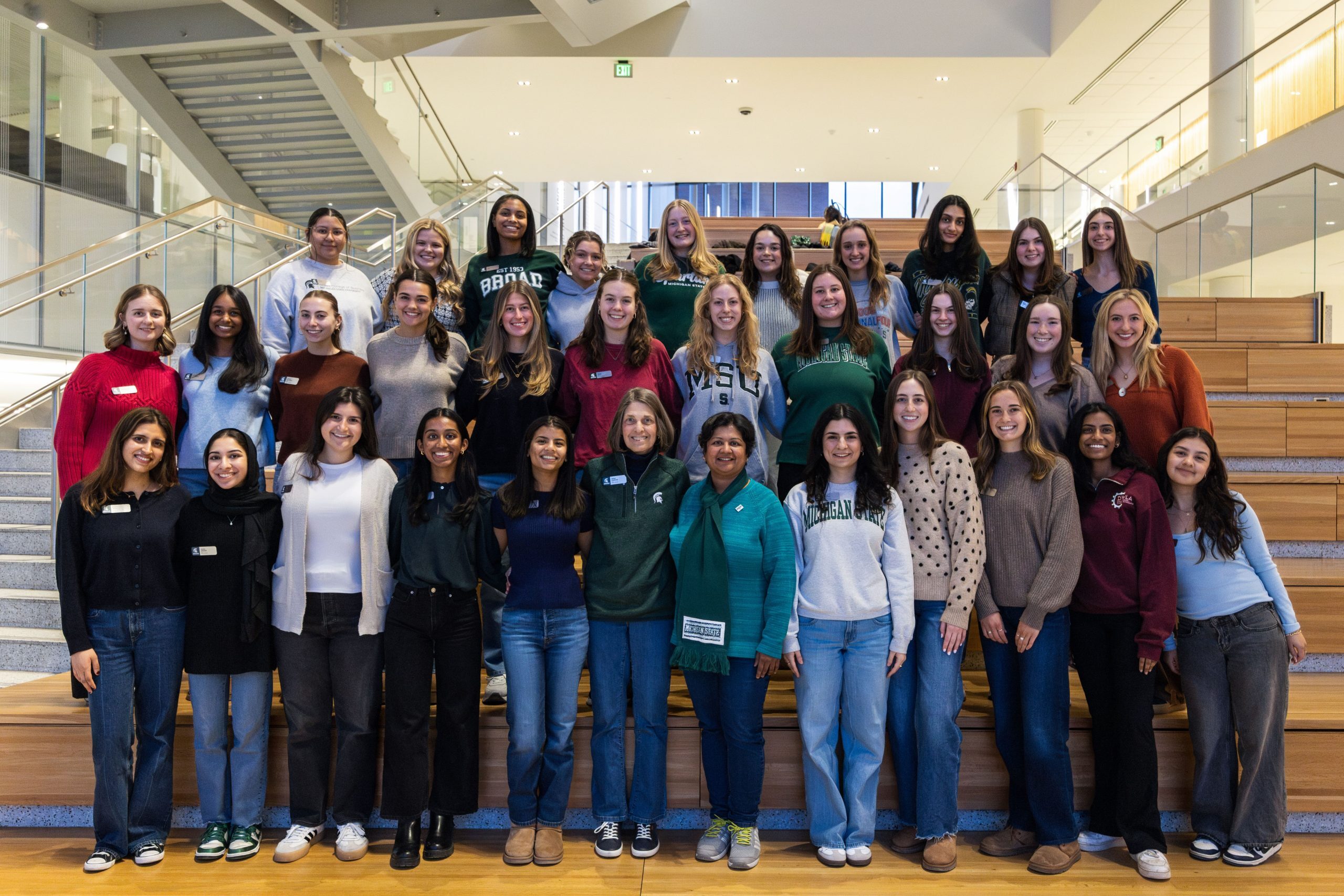 The Dashney Women's Leadership Accelerator 2025 cohorts group photo in the Minskoff Pavillion