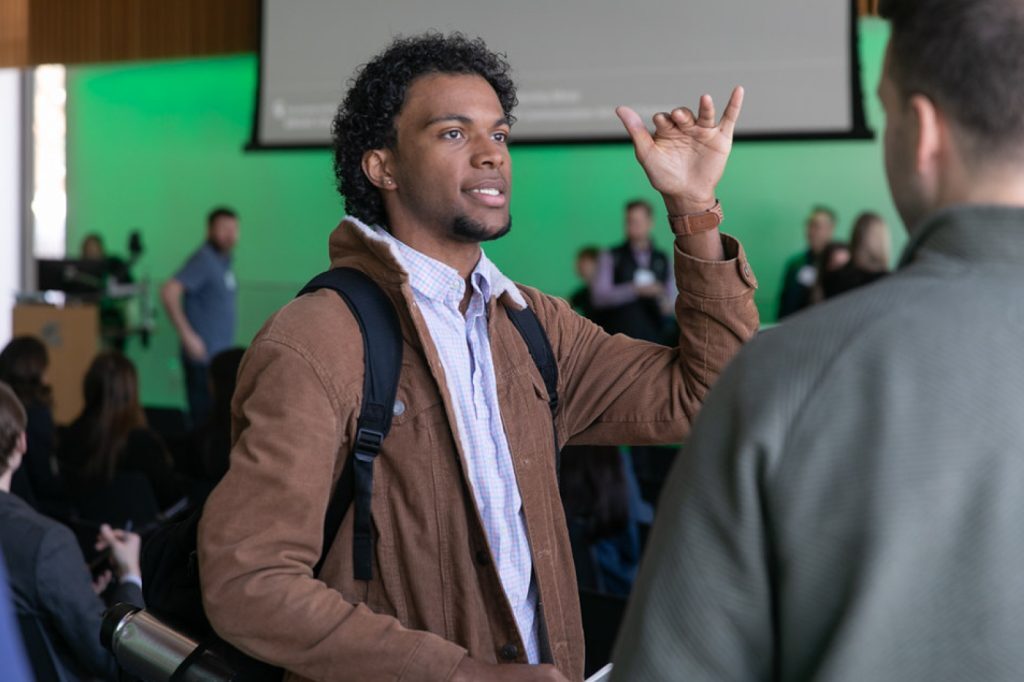 Event participants speaking to each other