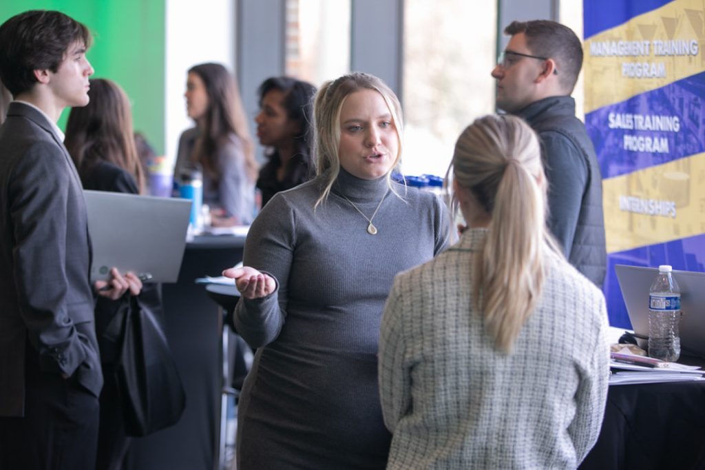 Event participants talking with each other