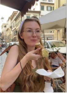 Ren Phillips enjoying a pastry 