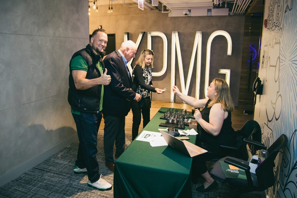 Event attendees signing in for the event