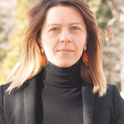 A professional headshot of Vincenzina Caputo