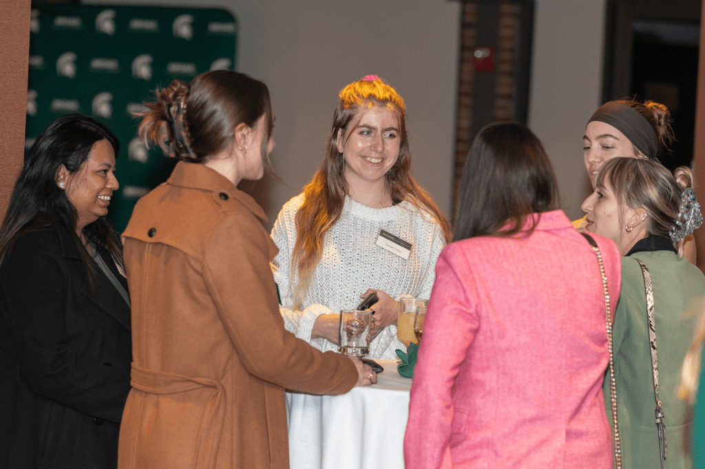 Group of people talking in a circle