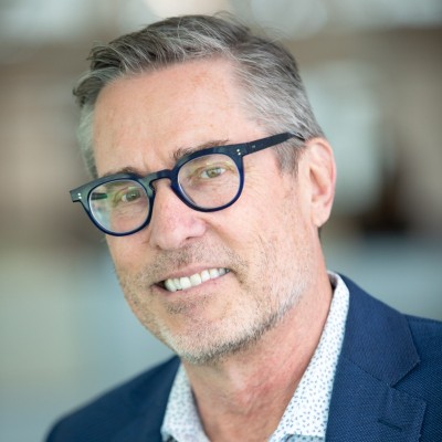 A professional headshot of Erik Petrovskis.