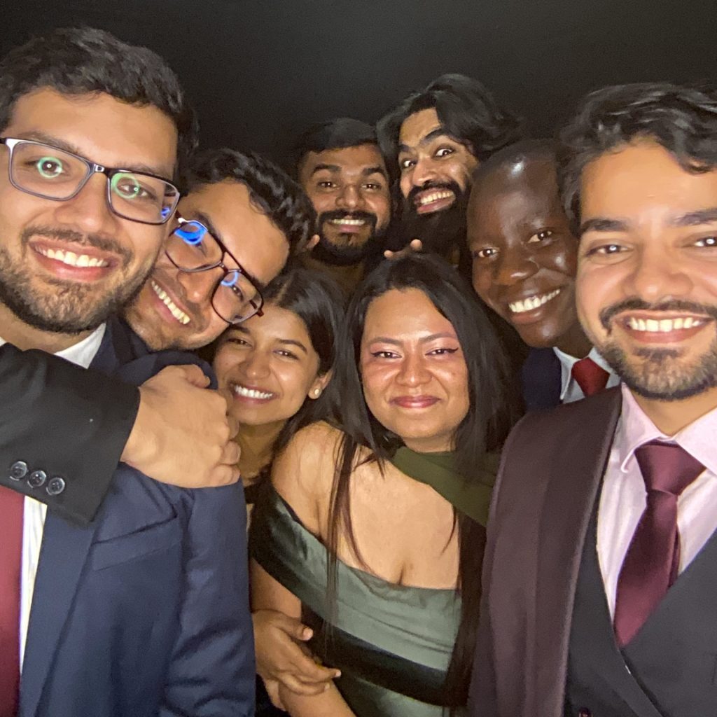 photo booth photo of several young adults smiling