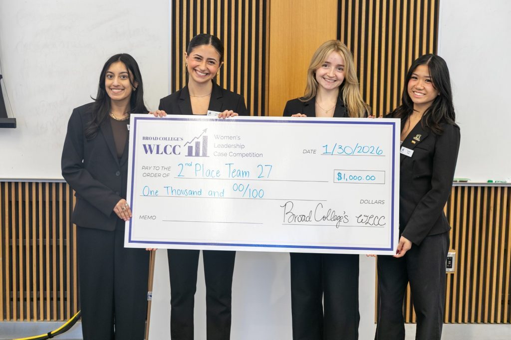 2nd place winners with oversized check