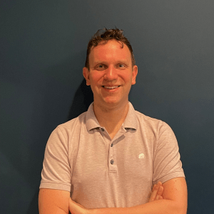 A professional headshot of Brian Lipinski