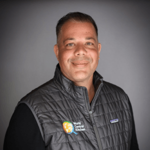 A professional headshot of Jason Collis