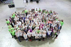 Teens gather for a group photo at EmpowHER retreat.
