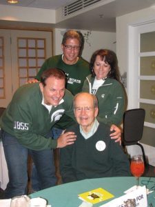 Vlahakis, Perry, Thompson, and classmate Jeff White (BA ’87), pictured in 2012.