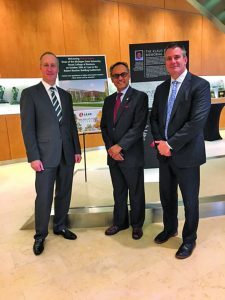 Jason Cardew, Sanjay Gupta and Ray Scott