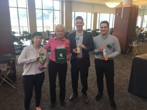 MBA students pose with P&G's Cheryl McKettrick.