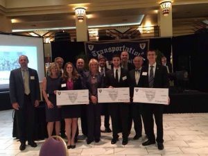 Sarah Kight, Nolan Russ and Moussa Zaatar, are awarded scholarships from the Transportation Club of Detroit.