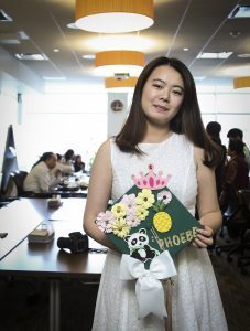A Broad College of Business graduate-to-be poses for a photo during a pre-commencement gathering Saturday, May 5. Photo by Matthew Dae Smith
