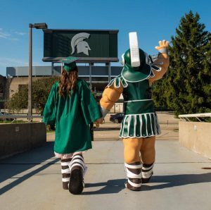 Nicole Niemiec and Sparty wave good-bye to Spartan Stadium. Photo courtesy Nicole Niemiec