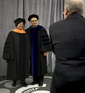 Apple Inc. executive and Eli Broad College of Business alum Priva Balasubramaniam and Eli and Edythe L. Broad Dean Sanjay Gupta pose at Fall 2017 Commencement ceremonies. Photo by Matt Dae Smith