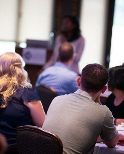 Full-Time MBA students listen to a speaker during the Fall 2018 Extreme Green competition. Photo by Zach Hall