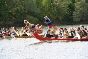 The "Broad Means Business" team rows toward the finish line at the Capital City Dragon Boat Race on Sept. 16, 2018