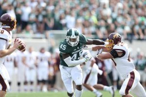 Darien Harris (45) during his athletic career at MSU. Photo courtesy MSU Athletic Communications