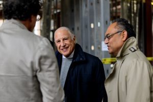 Edward J. Minskoff (center) and Broad College of Business Dean Sanjay Gupta (right) arrive at the Edward J. Minskoff Pavilion naming ceremony Friday, Oct. 19. Photo by Kasra Raffi