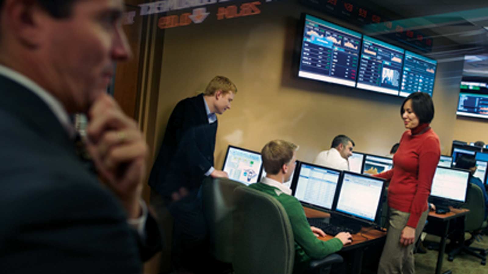 Looking through glass into the Financial Analysis Lab in Eppley Center on the campus of MSU.