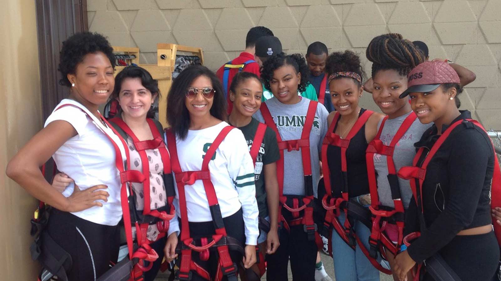 NABA students pose for a group photo at a team building event.