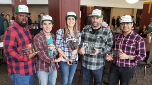 The winning team in the Class of 2019 Executive MBA pitch competition celebrates their win