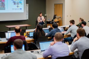 Jennifer Holahan gives a lectures to MBA students