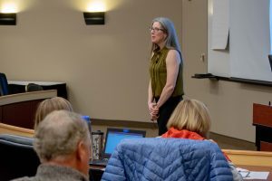 Jessica Garcia stands at the front of a lecture hall