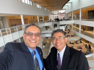 Dean Sanjay Gupta shows UGM Rector/President around the Minskoff Pavilion.