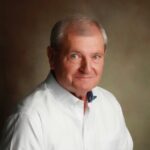 Headshot of Michigan State alumnus Andy Darien (MBA ’68), president and CEO