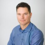 Headshot of Michigan State alumnus John Darien (B.A., MBA Professional Accounting ’92), VP and CFO